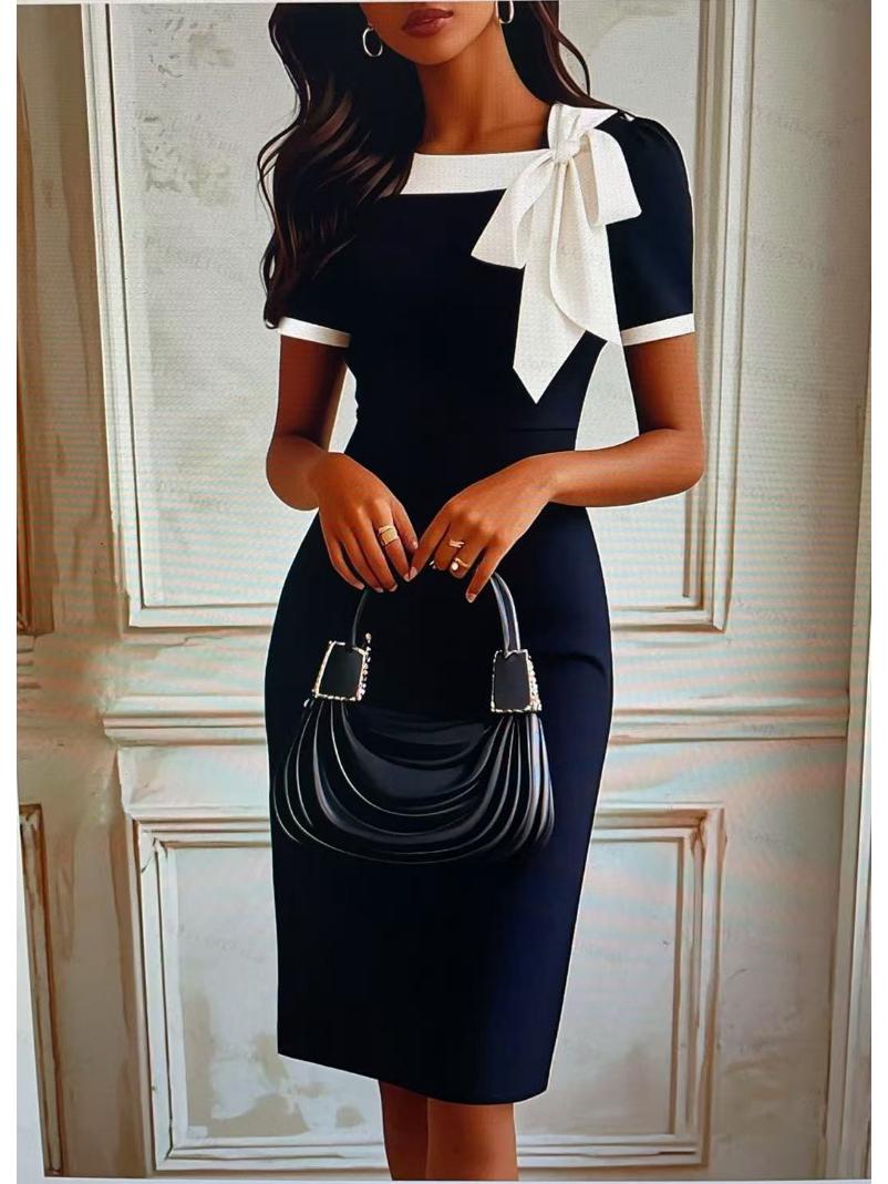 

Елегантна жіноча сукня-печворк з бантом - Приталена, з круглим вирізом, контрастного кольору M чорний