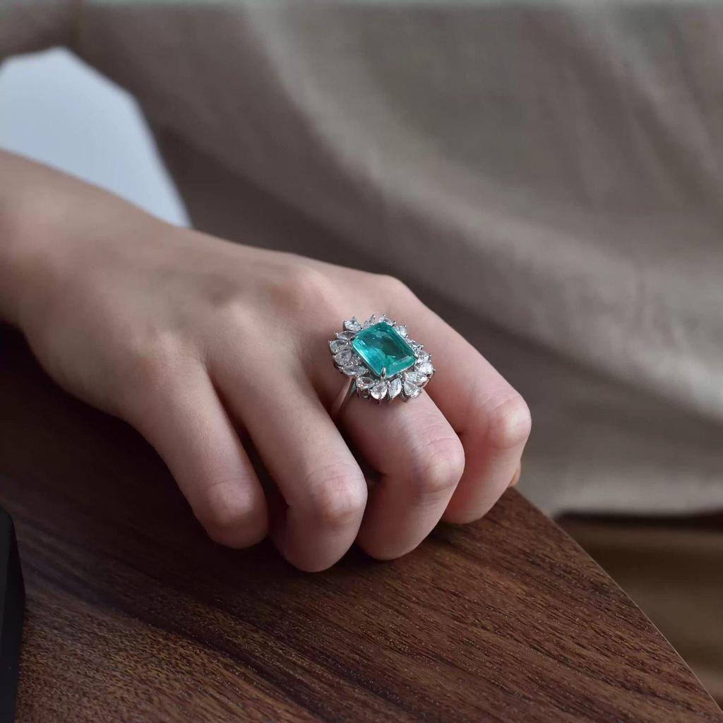 Europäischer & Amerikanischer S925 Sterling Silber Ring mit 10*12 Smaragd-Schliff Paraiba Blauer Stein für Damen