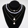 Fashion Boho Pearl Multilayer Necklace Set for Women Gold Plated Starfish Shell Pendant Choker Beach Party Vacation Jewelry 2026