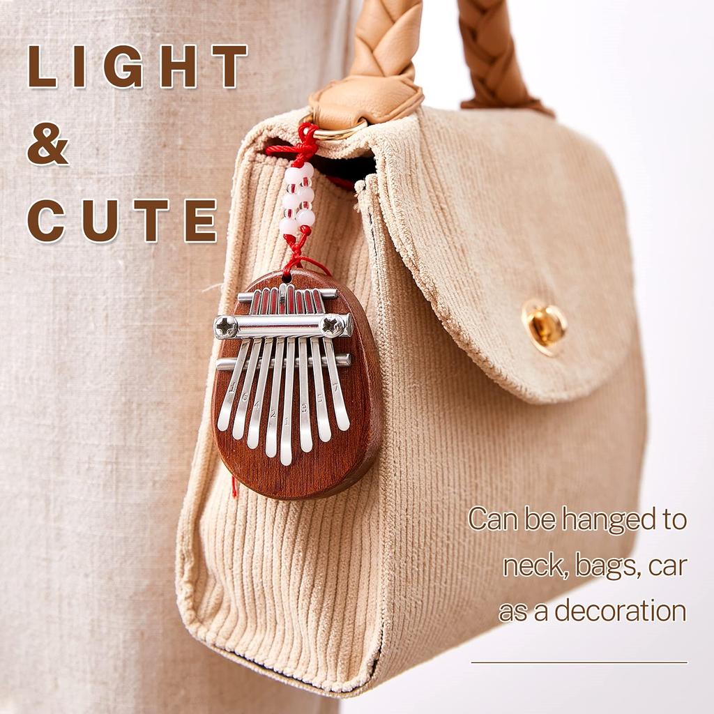 Mini Kalimba 8 Tangi Tumme Piano 1 Förpackning Vattendroppe Stil Sött Instrument Bärbar Utsökt Gåvoset för Barn