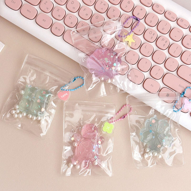 1 box of 16 bling pocket soft keyrings