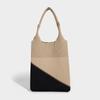 High-End-Tragetasche Nische Große Kapazität Faltbar Leicht Waschbar Geometrisches Dreieck Farbblock-Tasche Fliegenweb-Tasche