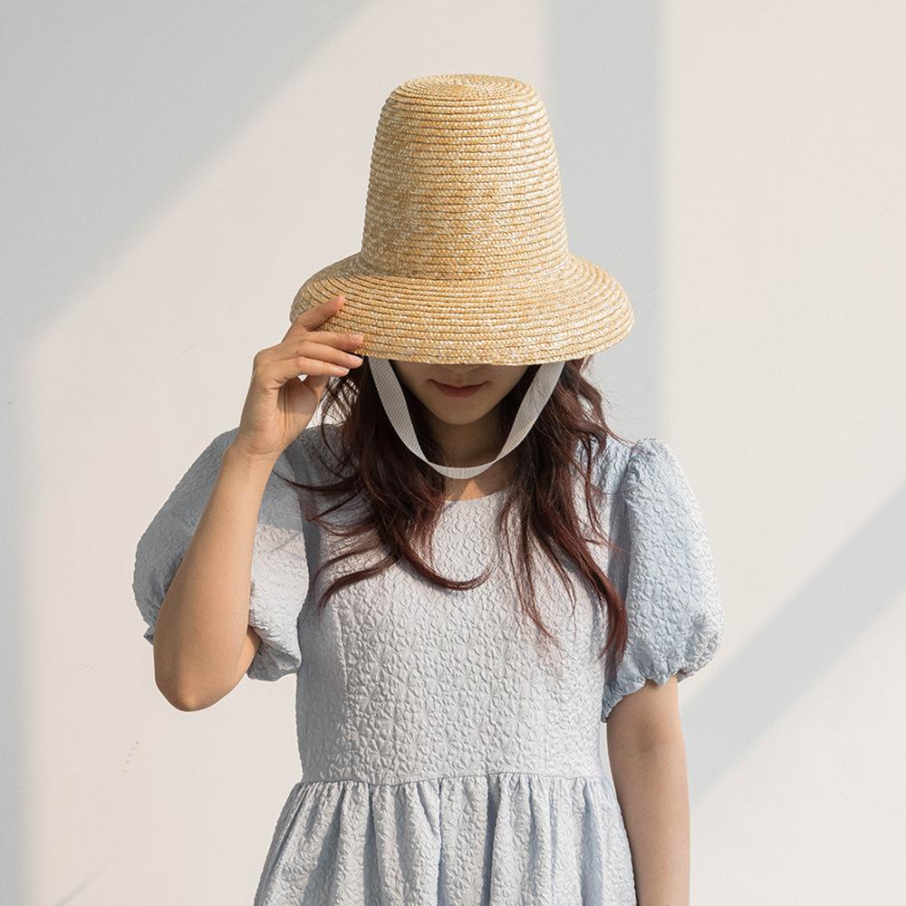 Spring and summer new fashionable retro concave shape with straps High top straw straw straw hat Outdoor sun protection Shade catwalk straw hat
