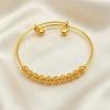 Elegant open bangles with various beaded decorations and bells are suitable for women to wear on various occasions such as weddings, banquets, and