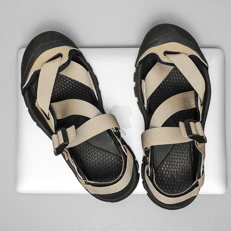 Sportssandaler herr mesh andningsbara sommar 2025 nya strand sandaler avslappnade halkfria väska huvud slitstarka tofflor