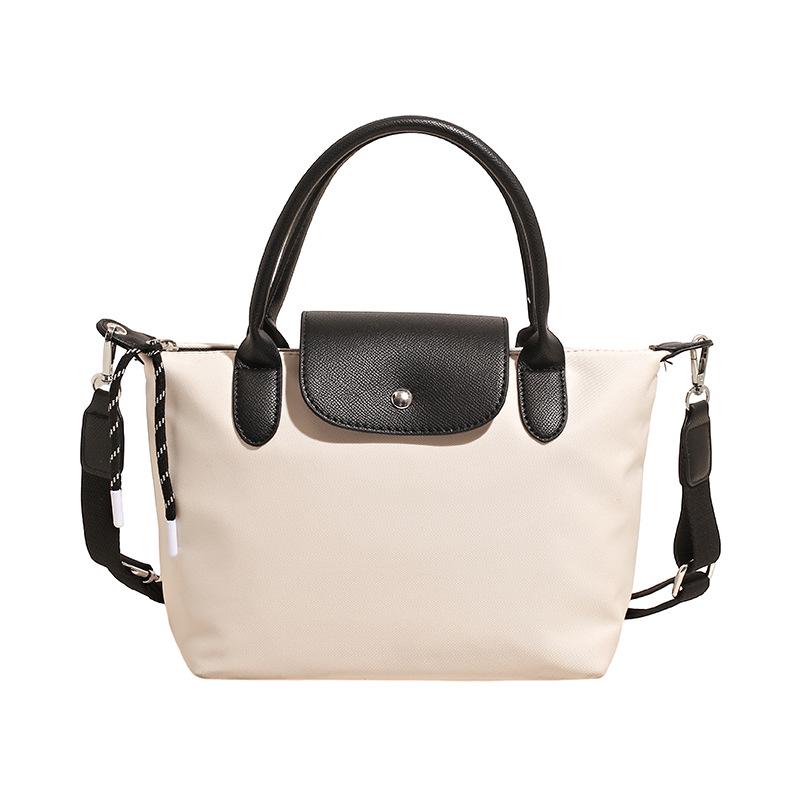Minimalist Color-Block Oxford Cloth Handbag: Versatile, Fashionable Shoulder Bag with Unique Texture.