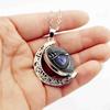 Unisex drehbare Drachenauge Hohlmond Anhänger lange Kette Halskette Schmuck