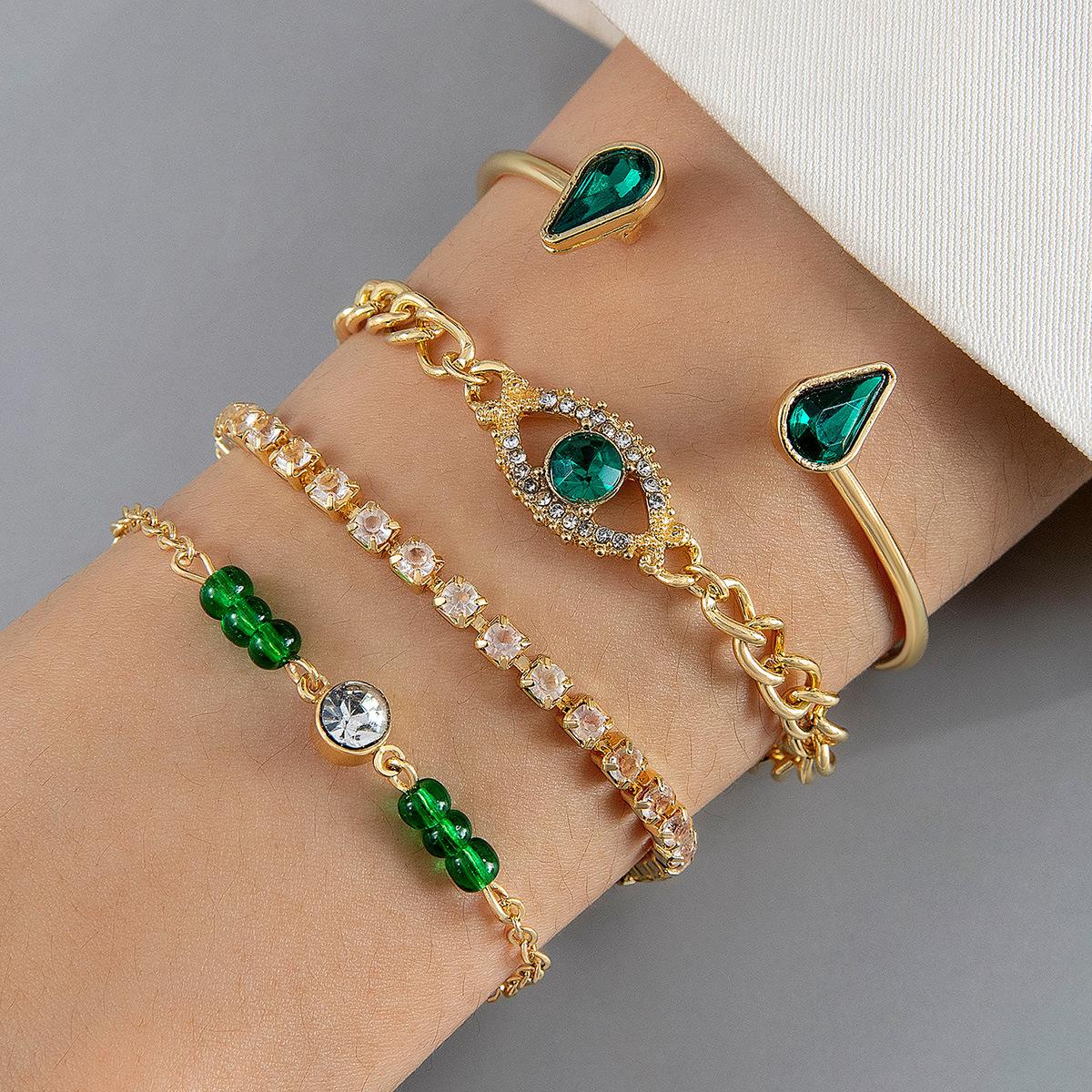 Bracelet set with diamond-encrusted heart and imitation emerald gemstones for women, unique snake-shaped jewelry 26108-gold
