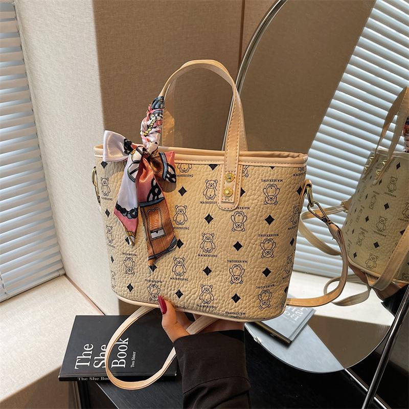 

Сумка премиум-текстуры маленькая женская весенне-летняя универсальная 2025 новая сумка-мессенджер женская нишевая портативная сумка-ведро