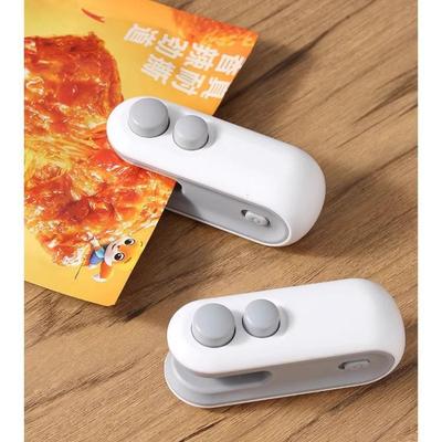 Portable Snack Sealing Machine: Dual-Purpose for Bag Opening and Food Preservation.