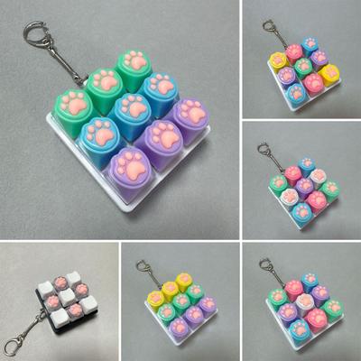 9-Tasten Fidget Tastatur Spielzeug Stress Angst Abbau Katze Pfote Tastatur Finger Clicker Schlüsselanhänger Tragbarer Dekompressionsknopf Sensorisches Spielzeug
