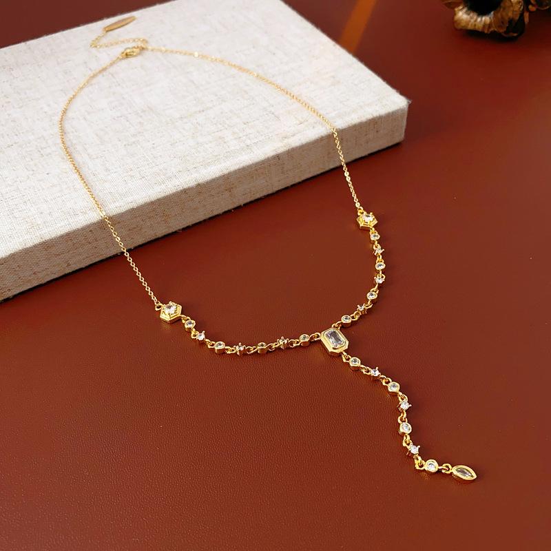 Gold Electroplated Oval Zircon Tassel Necklace - Korean Light Luxury, High-End Sweater Chain, European & American Style for Women