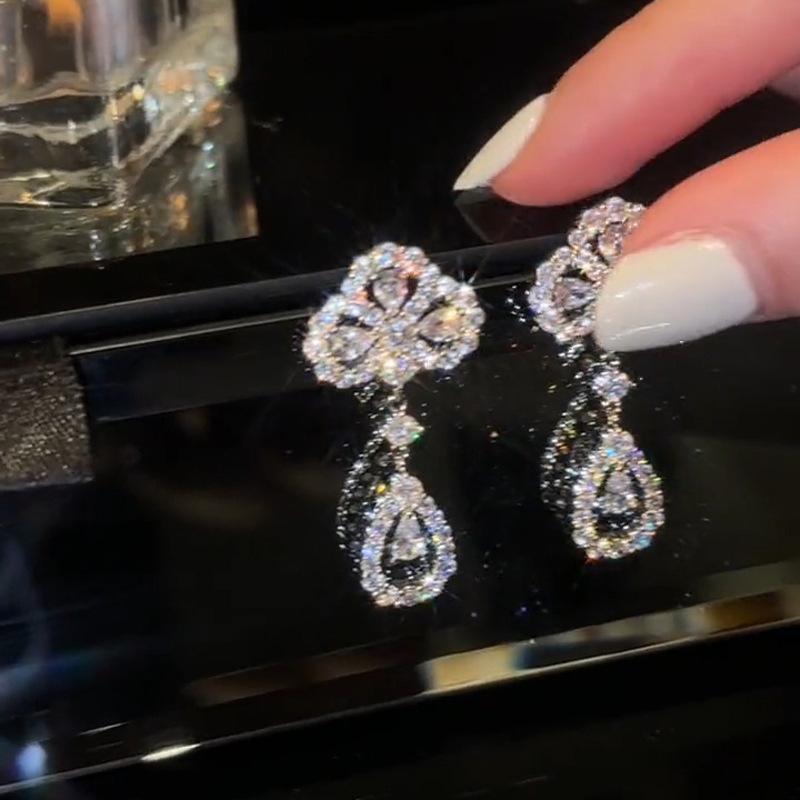

Zircon flower water drop pendant earrings femininity high-end stud earrings fashion light luxury niche design earrings