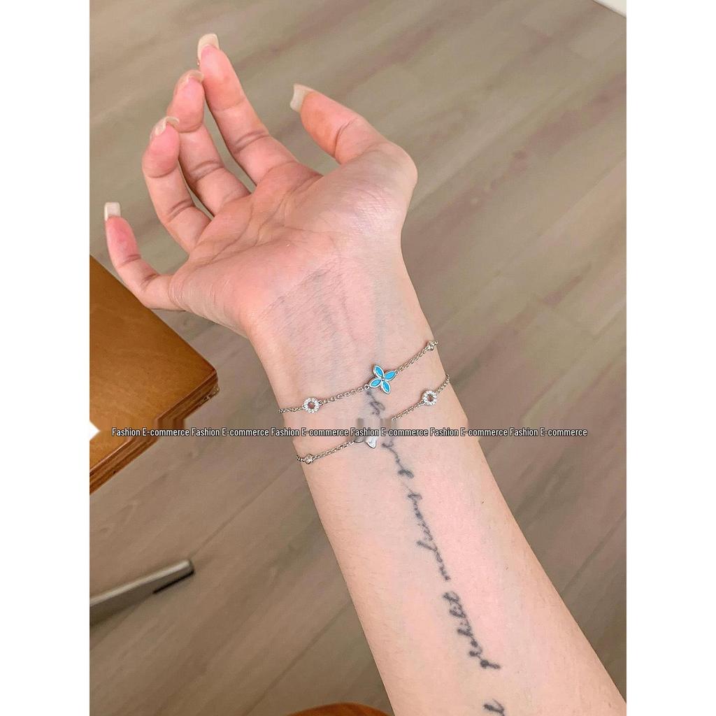 Exquisite Blue Four-Leaf Flower Zircon Bracelet: Versatile, High-Value, Micro-Paved, Stacking Jewelry