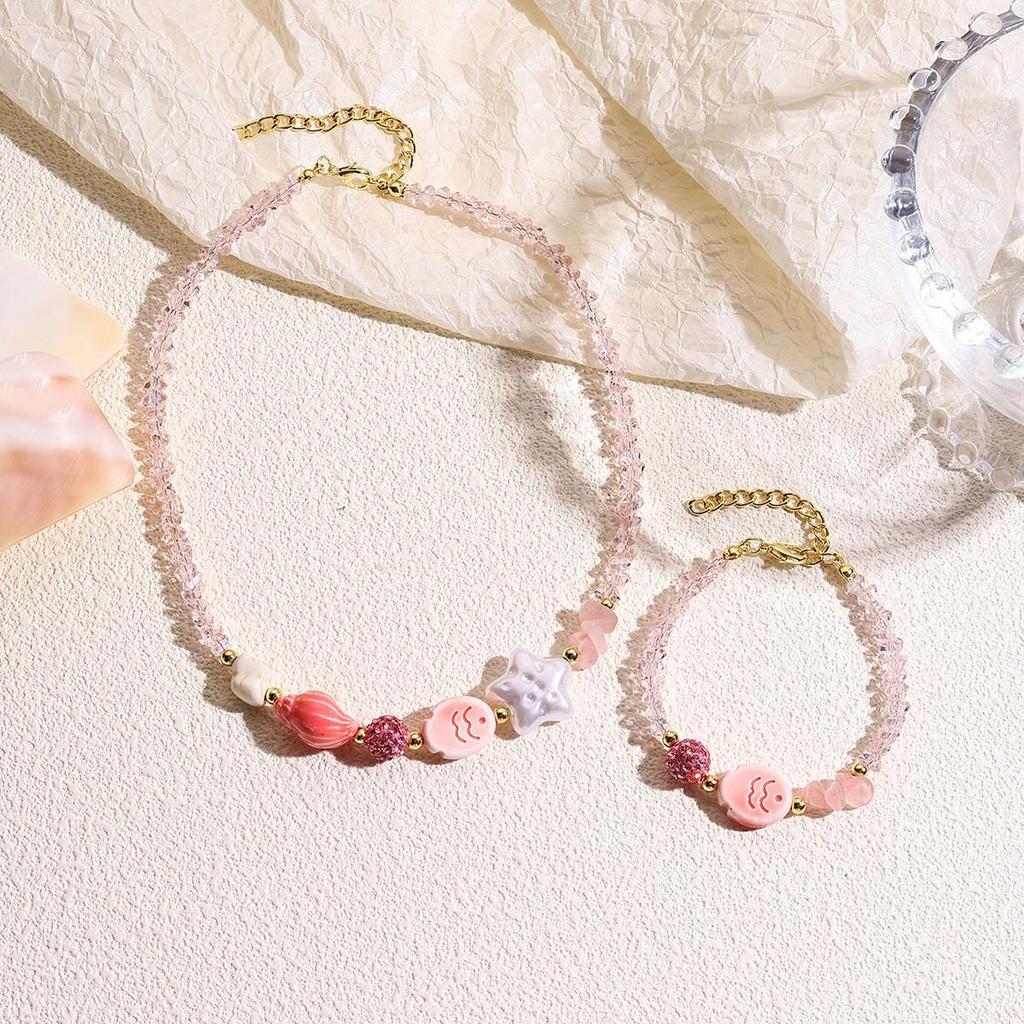 Seaside Elegance: Starfish & Shell Bead Bracelet with Oceanic Flair