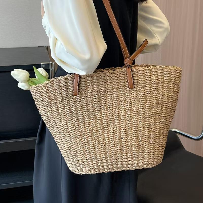 Neue Sommer vielseitige strohgewebte Tasche Damen gewebte Tasche große Kapazität Tragetasche Gemüsekorb Damen Tasche Urlaubs Umhängetasche