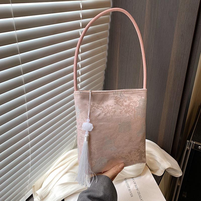 

Сумка женская летняя новая высокоценная повседневная вышивка на плечо высококлассная сумка-ведро розовый