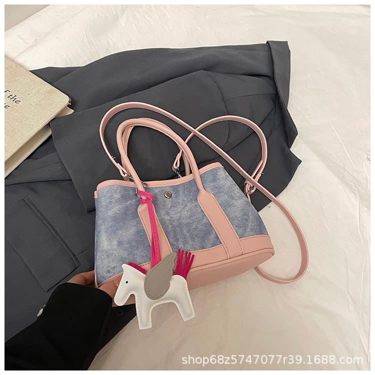 2025 new niche design handbag large capacity canvas contrasting color tote bag commuter shoulder messenger bag women