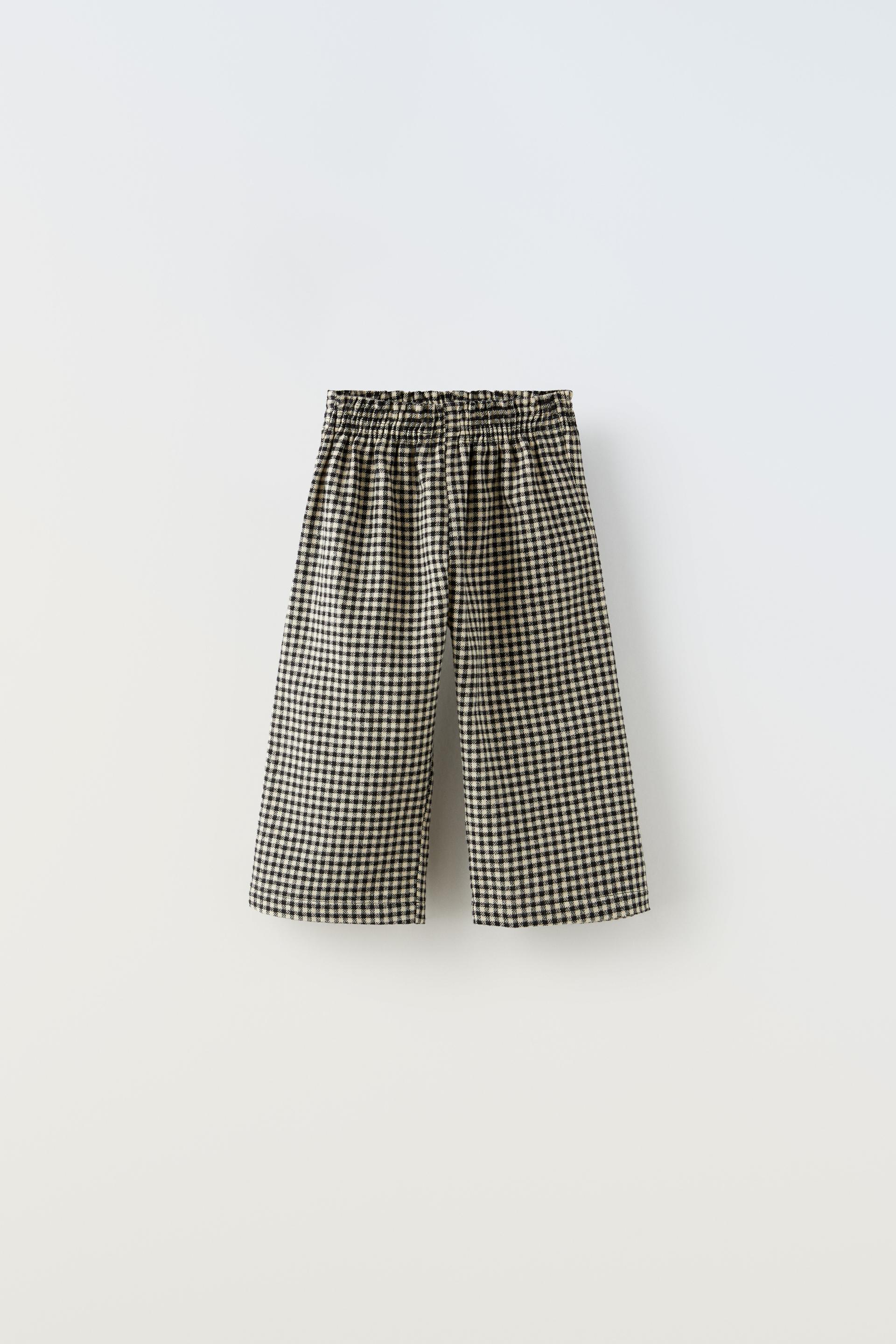 

СТРУЮЩИЕСЯ БРЮКИ В КОРЗИНКУ