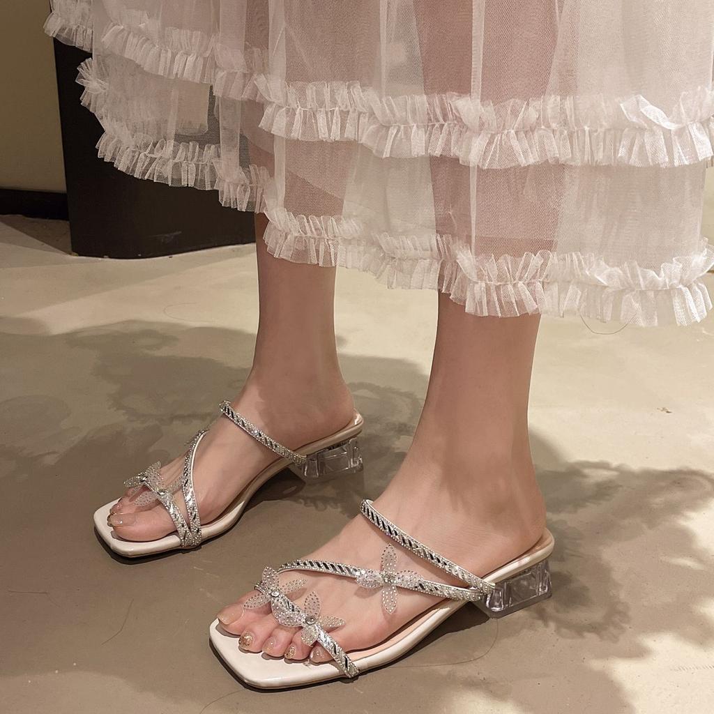 Internet celebrity high sense rhinestone cool slippers 2025 women's summer word with medium heel thick heel fashion wear not tired feet slippers