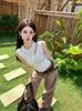Real shot, Spice Girl irregular fake two-piece hollow vest summer design sense slim and thin short top