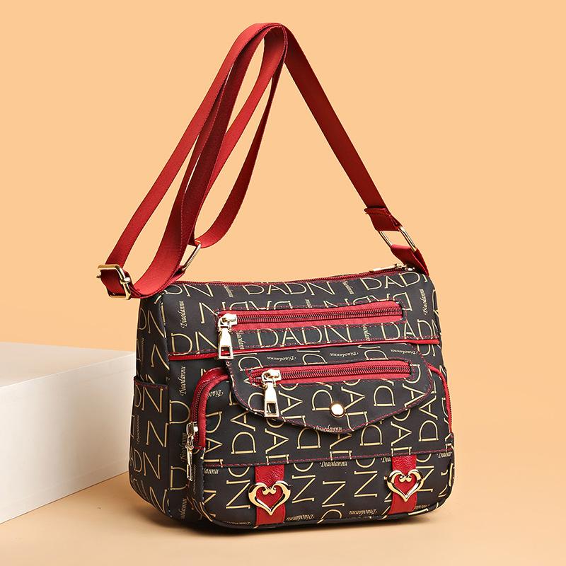 

In the elderly bag women s Oxford canvas bag multi-pocket shoulder bag women s mother bag messenger bag travel backpack