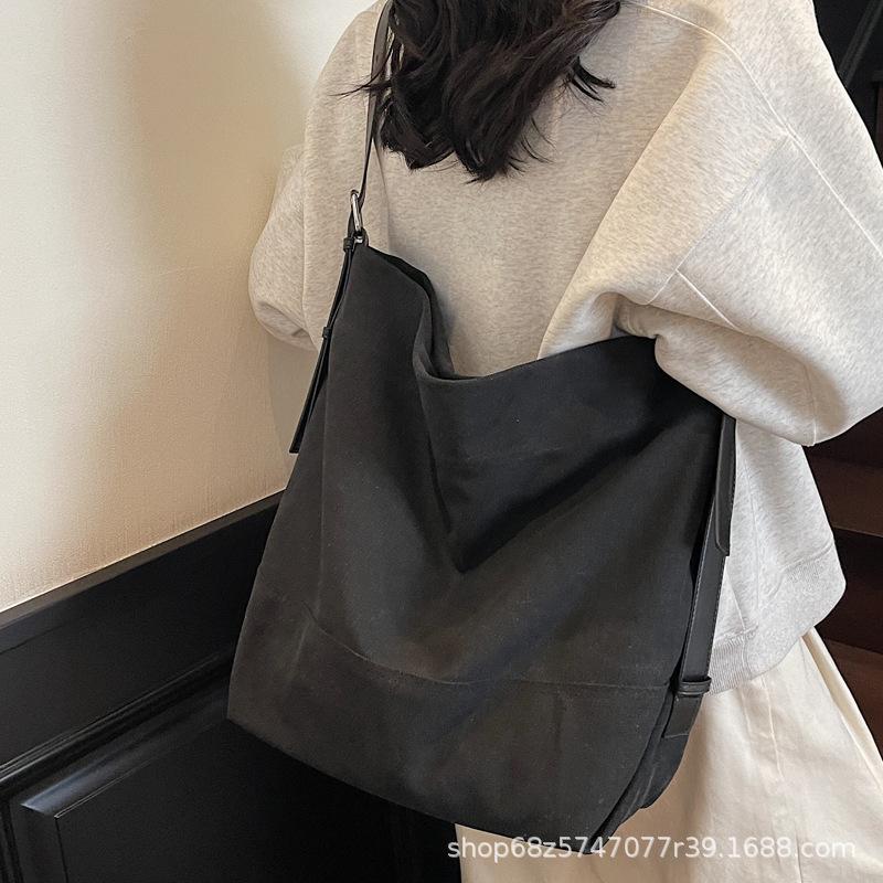 Casual large-capacity canvas bag women's 2025 new simple fashion tote bag Korean version commuter crossbody bag trend