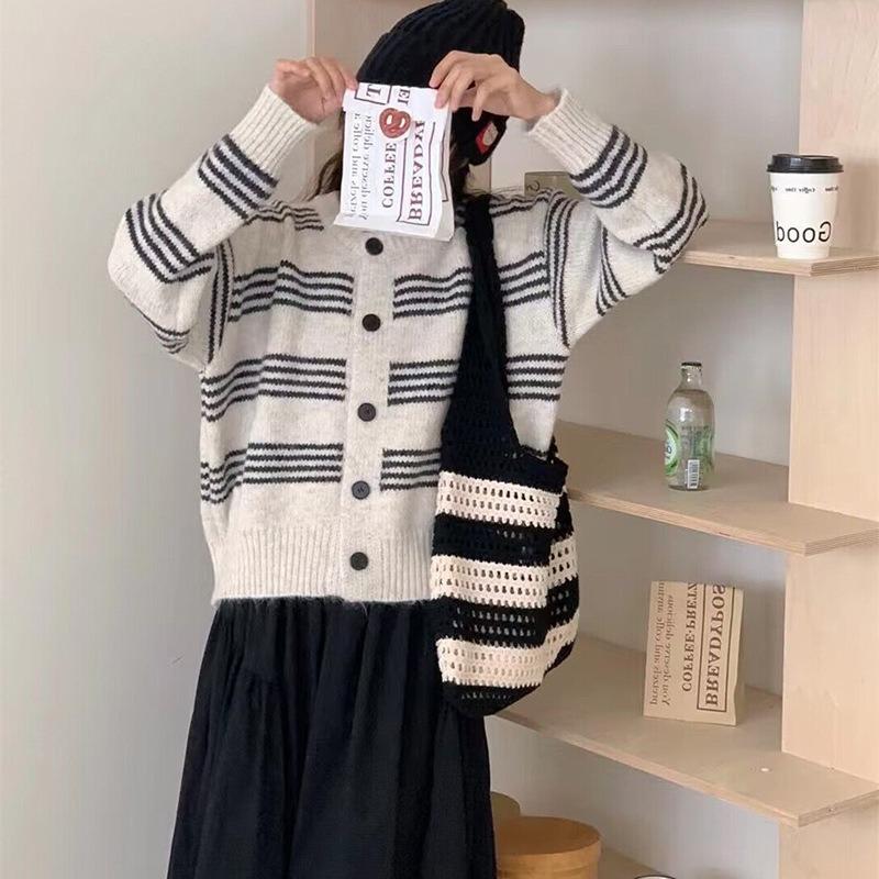 Autumn and winter new versatile striped contrasting color knitted cardigan top women's loose lazy wind outside sweater jacket