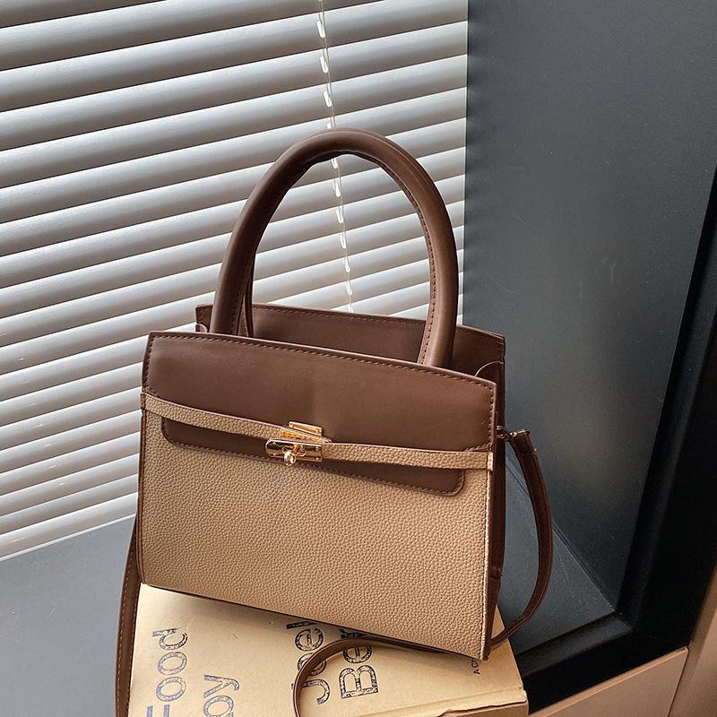 Bolsos de mujer extranjeros, elegantes y sencillos, portátiles, bandoleras cruzadas casuales de gran capacidad, versátiles, bolsos de empalme de contraste de color de alta gama