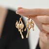 Elegant Pearl Drop Earrings: Irregular Metal 'Lava' Design with European & American Style