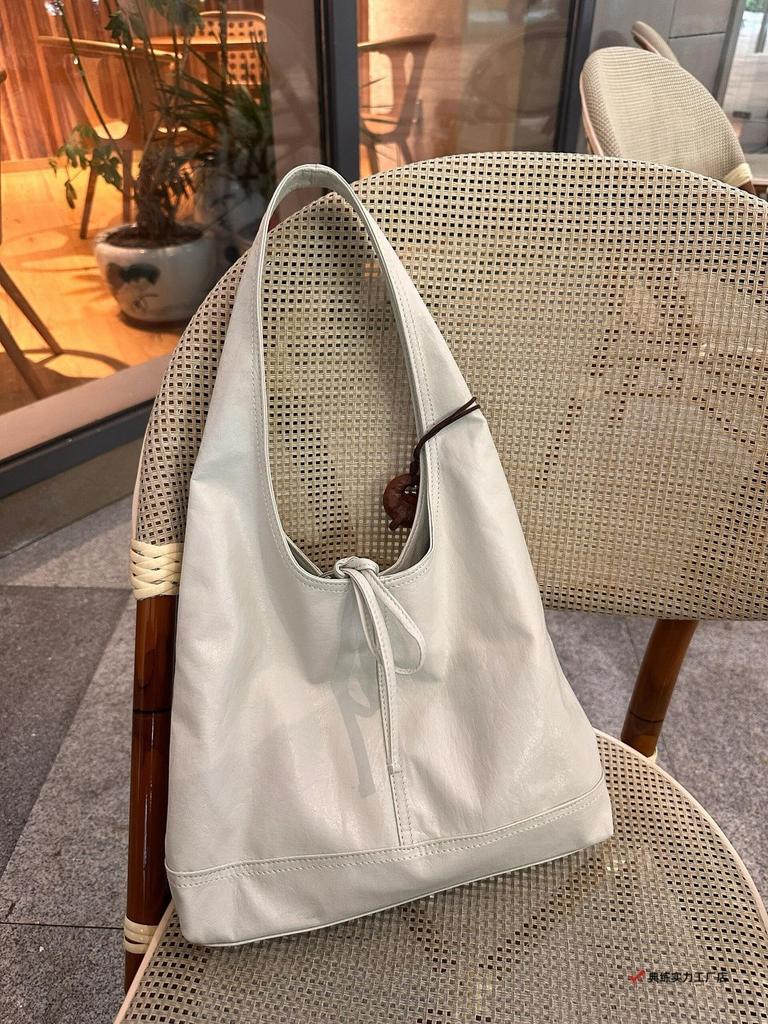 Korean bow strap solid color niche design portable underarm bag fashionable versatile lazy style texture tote bag
