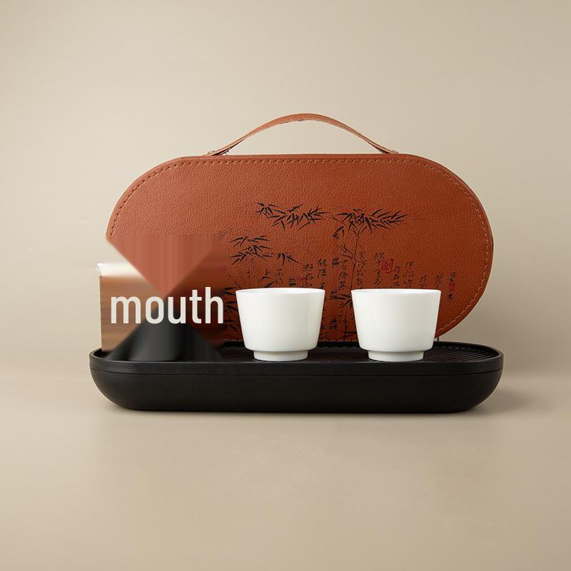 Sheep Fat Jade Portable Ceramic Tea Set - One Pot, Two Cups, Travel-Friendly Souvenir.