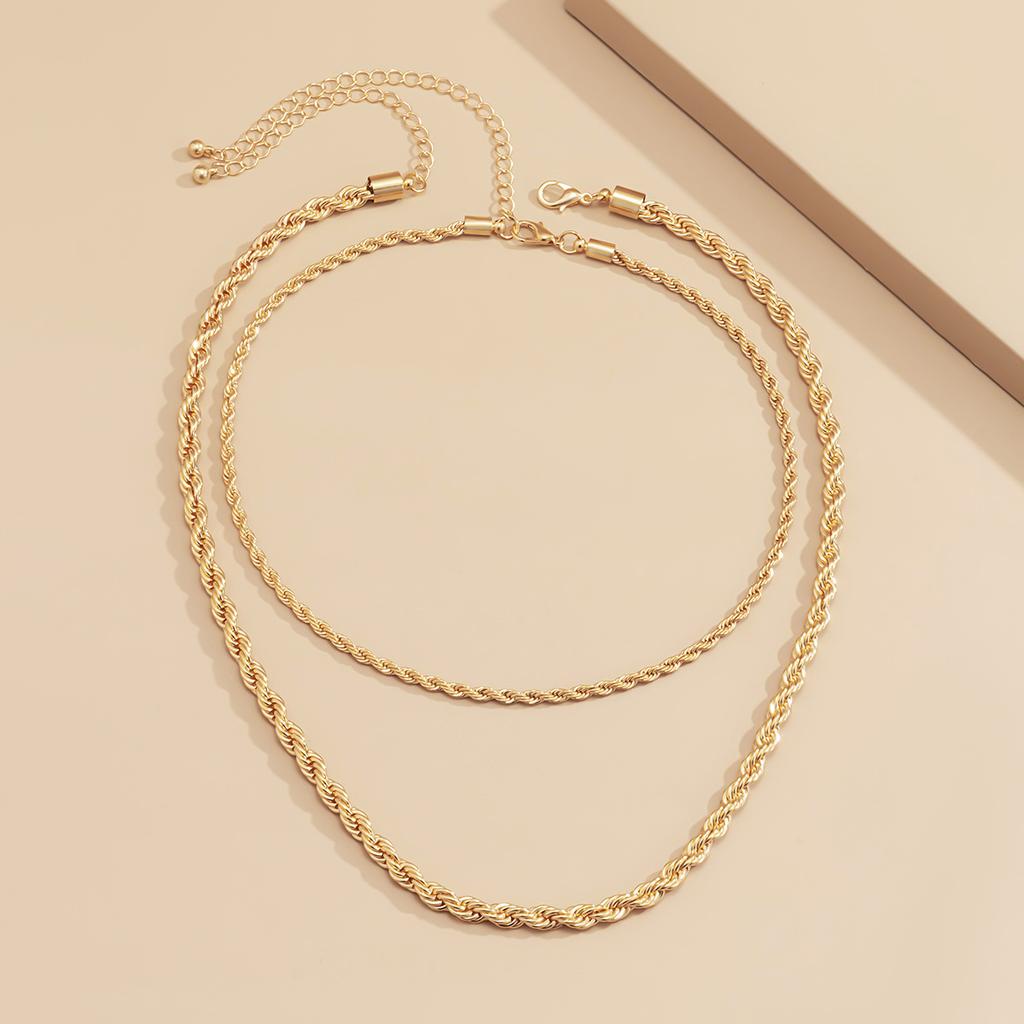 Hip-hop simple geometric twist chain necklace, street shot double-layer metal set necklace.