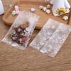 100Pcs Translucent Frosted Rose Flower Pattern Fruit Tea Candy Cookie Machine Sealed Bags Plastic Packaging