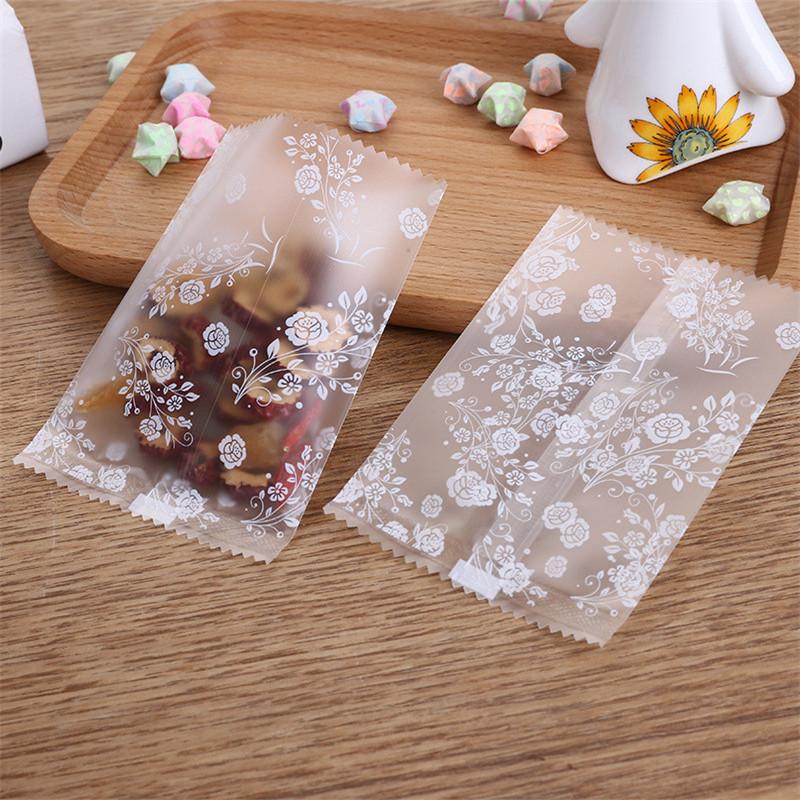 100Pcs Translucent Frosted Rose Flower Pattern Fruit Tea Candy Cookie Machine Sealed Bags Plastic Packaging