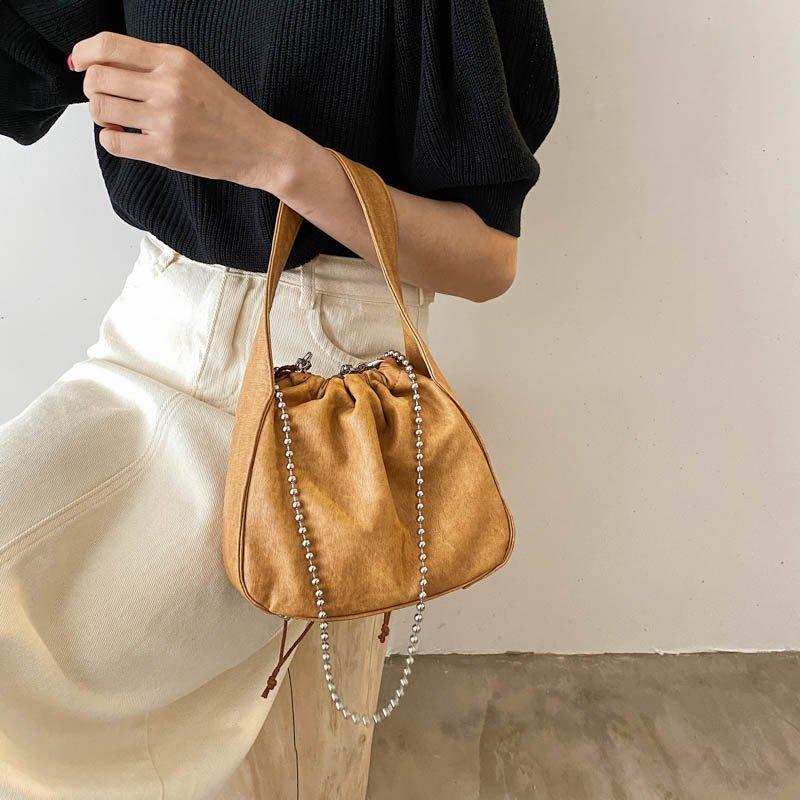the abroad leather shoulder bolsa
