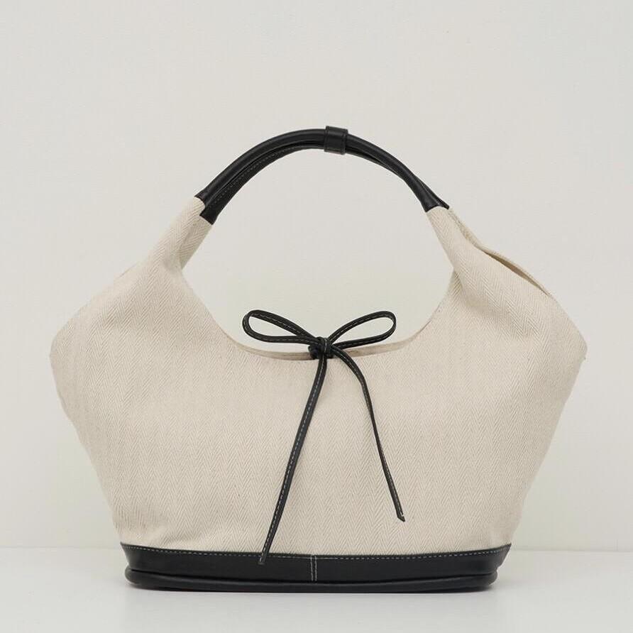 Splicing Canvas Bag Women's New Casual Commuter Fashion Handbag Versatile Shoulder Armpit Bag