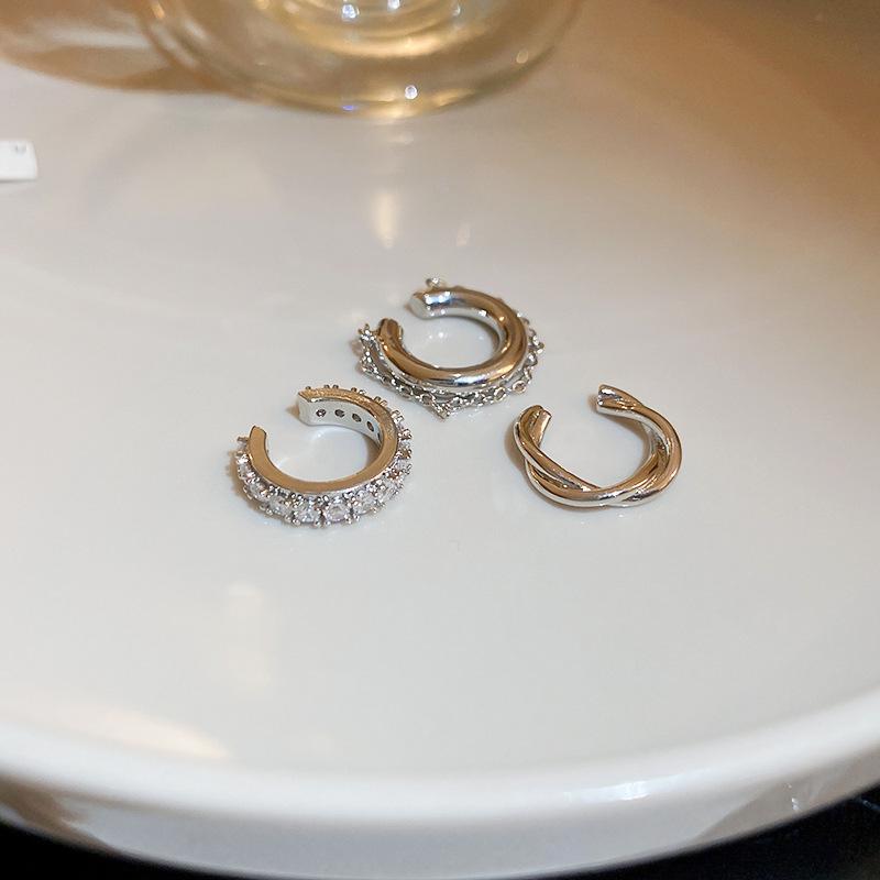 Zirkon Perlmutt Sunburst Ohrklemmen: Elegante, vielseitige Ohrringe für Frauen.