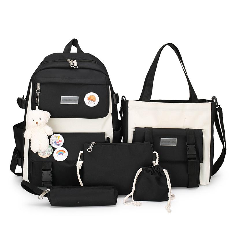 

Korean version primary school students junior high school students high school students large capacity small fresh and fashionable backpack with pendant чорний