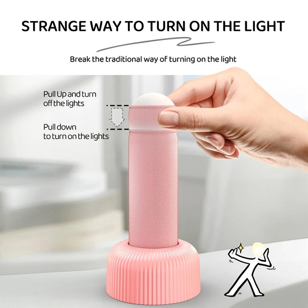 Interest Handheld Night Light Creative LED Sleeping Lamp Original Design Unique Switching Method Has A Base for Placing on Table