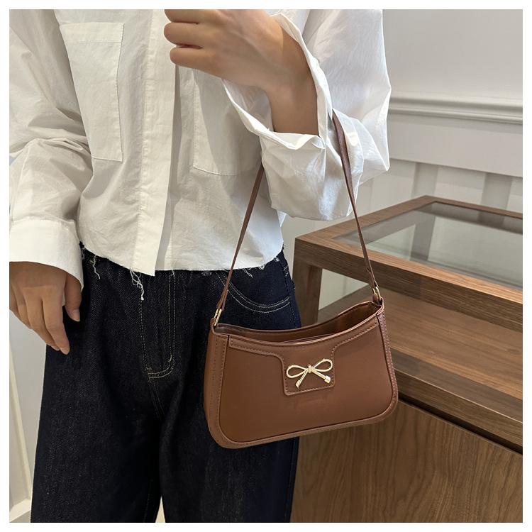 Fashion Bow Knot Faux Leather Armpit Bag Elegant Metal Decorated Shoulder Handbag for Women