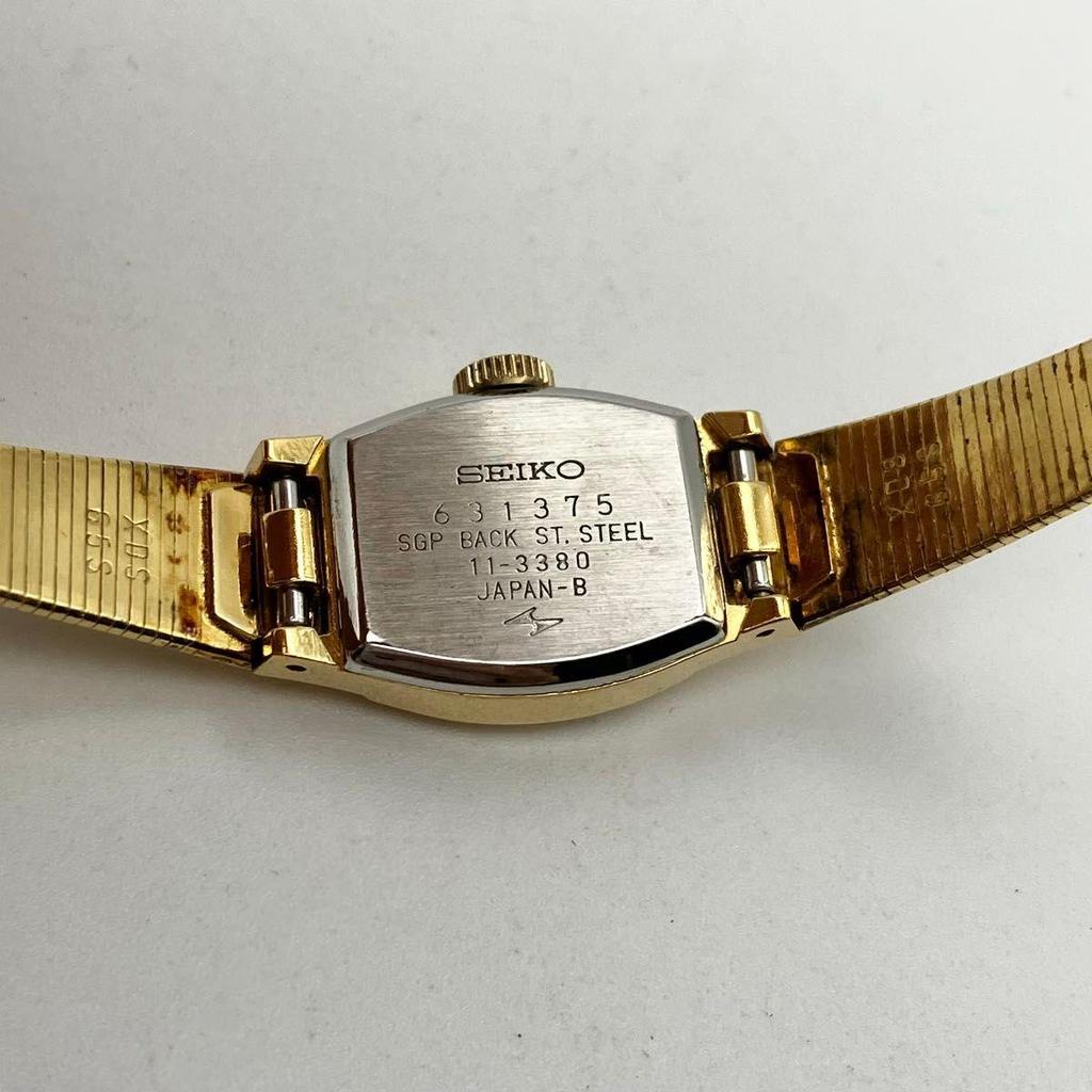 Used In good working condition Seiko ladies manual winding wristwatch gold green dial