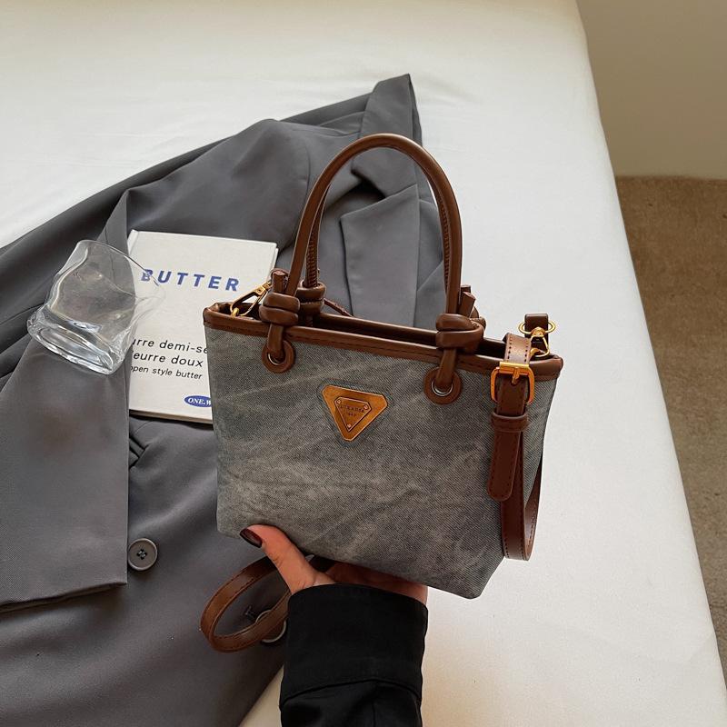 New product hot sale fashionable retro high texture women's hand bucket bag versatile commuter casual messenger bag