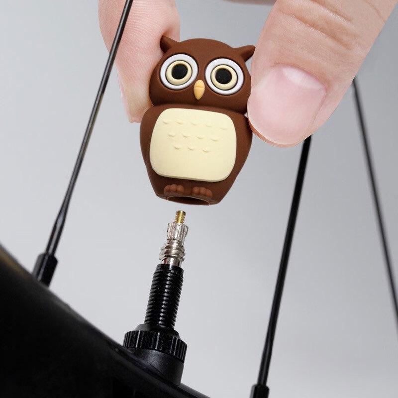 Tappi valvola luminosi a forma di osso e set di accessori per bicicletta