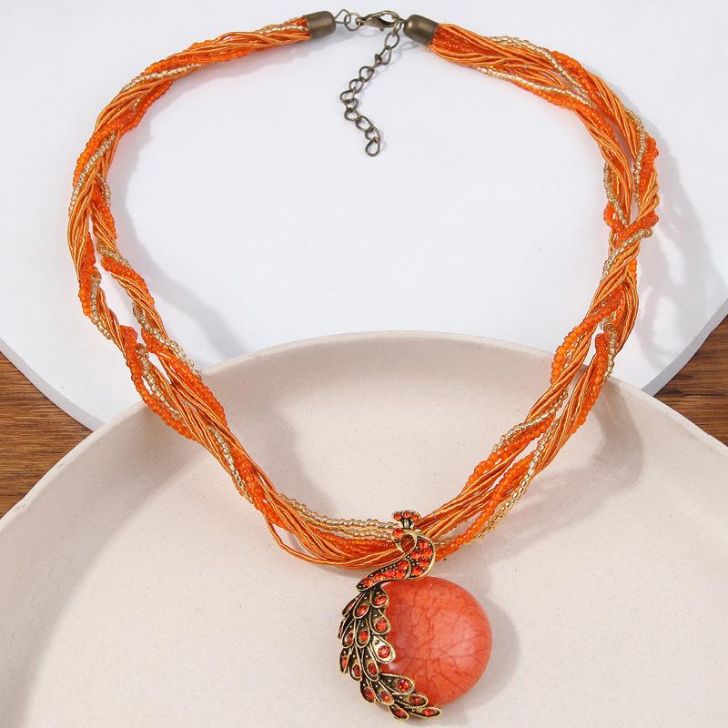 Elegante Vintage Fransen Quaste Anhänger Halskette Pfau Design für Damenpullover