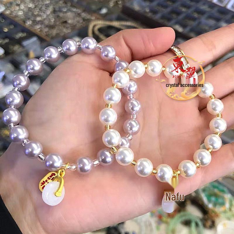 Purple and White Shell Bead Peace Buckle Bracelet with Gold Foil Ash Glaze Accents