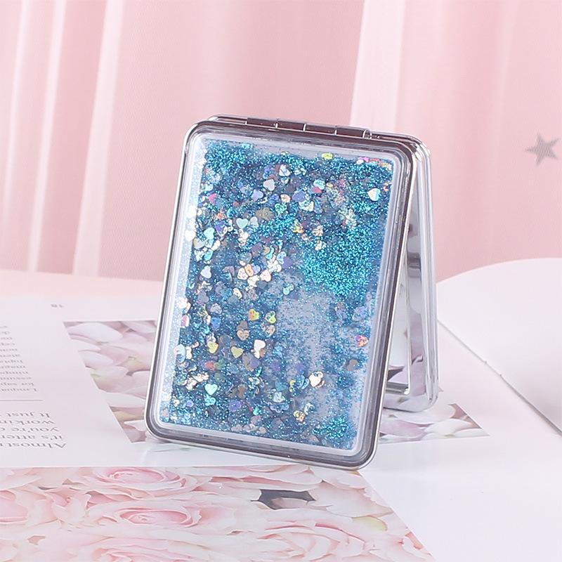 Girlish Heart Double-Sided Portable Makeup Mirror - Cute, Compact, and Foldable.
