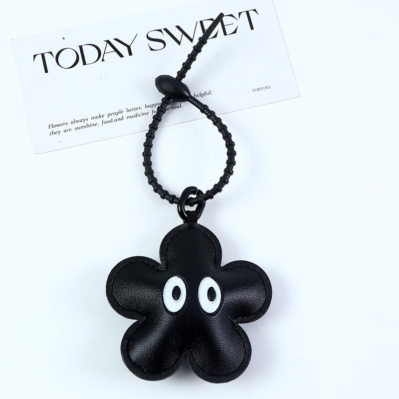 

Handcrafted Leather Small Flower Eye Bag Charm & Keychain