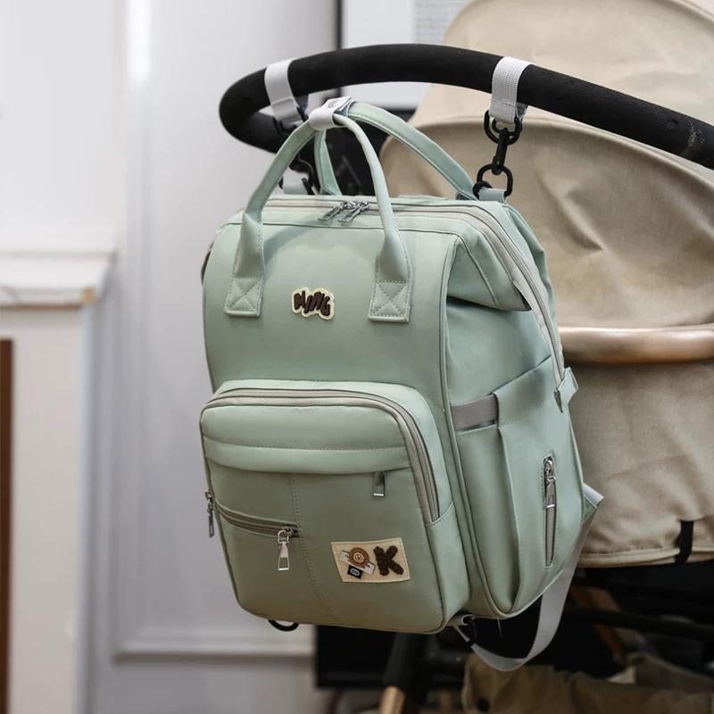 New Multifunctional Maternal and Infant Mommy Bag Large Capacity Portable and Lightweight Going Out Backpack Women's Waterproof Backpack Maternity Bag