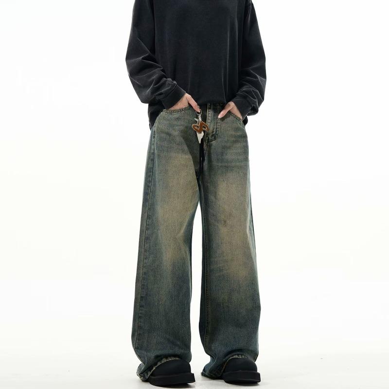 "Autumn Retro Men's Yellow Mud-Dyed Wide-Leg Jeans: American Brand, Loose Fit, Washed & Distressed."